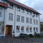 Haus der Begegnung Sandebeck - Blick zur Kirche QF